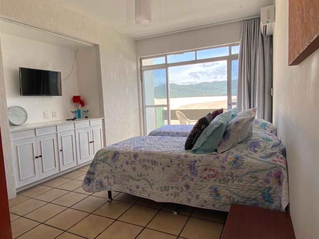 Pousada Das Dunas Via Praia Apart Hotel ฟลอเรียนอโปลิส ห้อง รูปภาพ